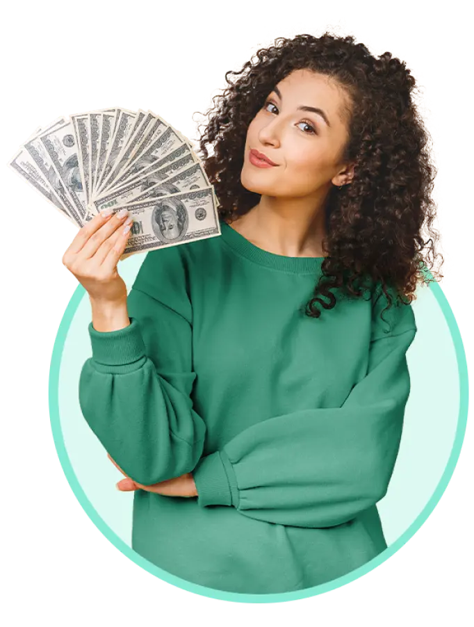 Young woman holding money